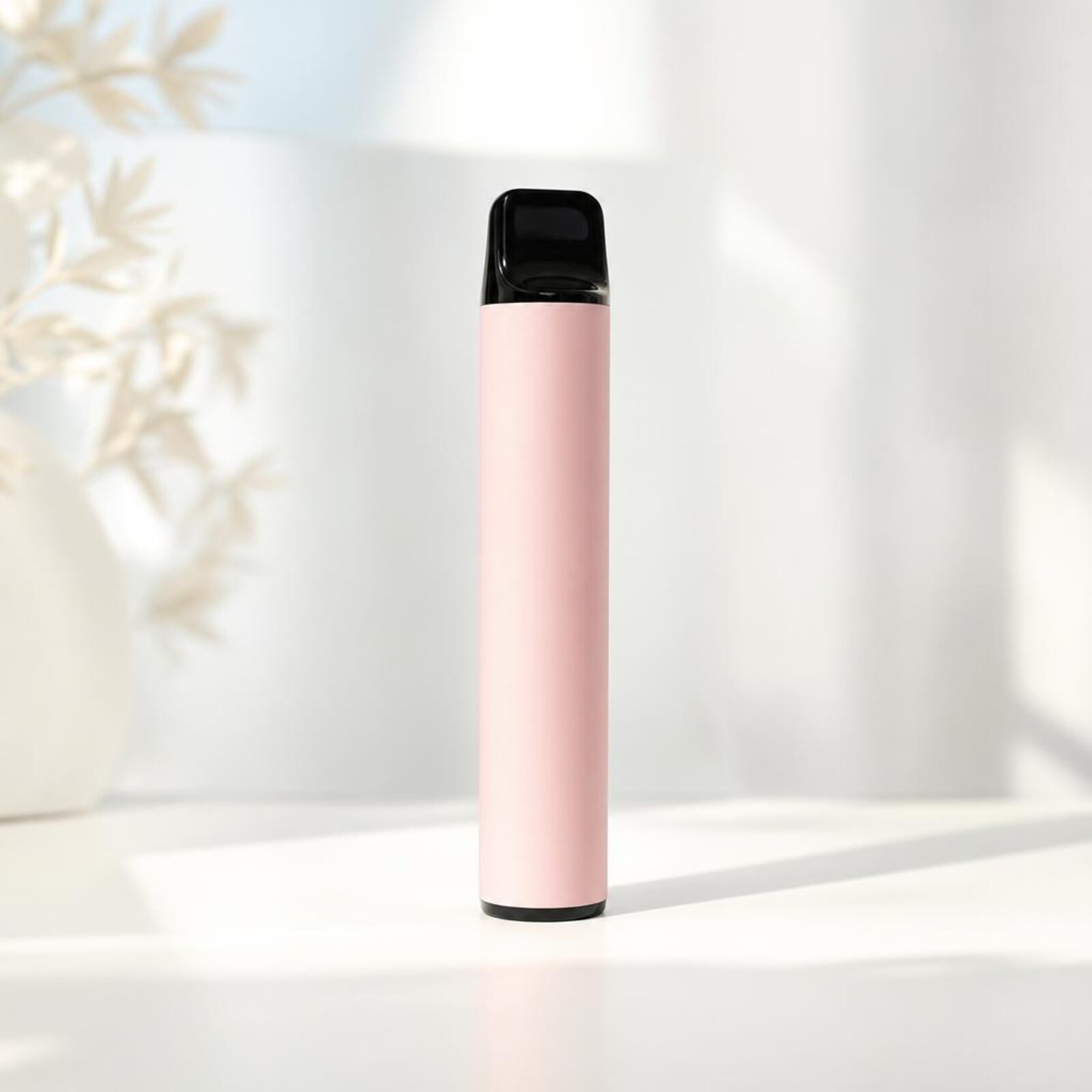 A single pastel-colored zero-nicotine disposable vape standing on a bright clean surface.